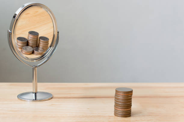 Money mirror reflection, Save money investment concept money mirror